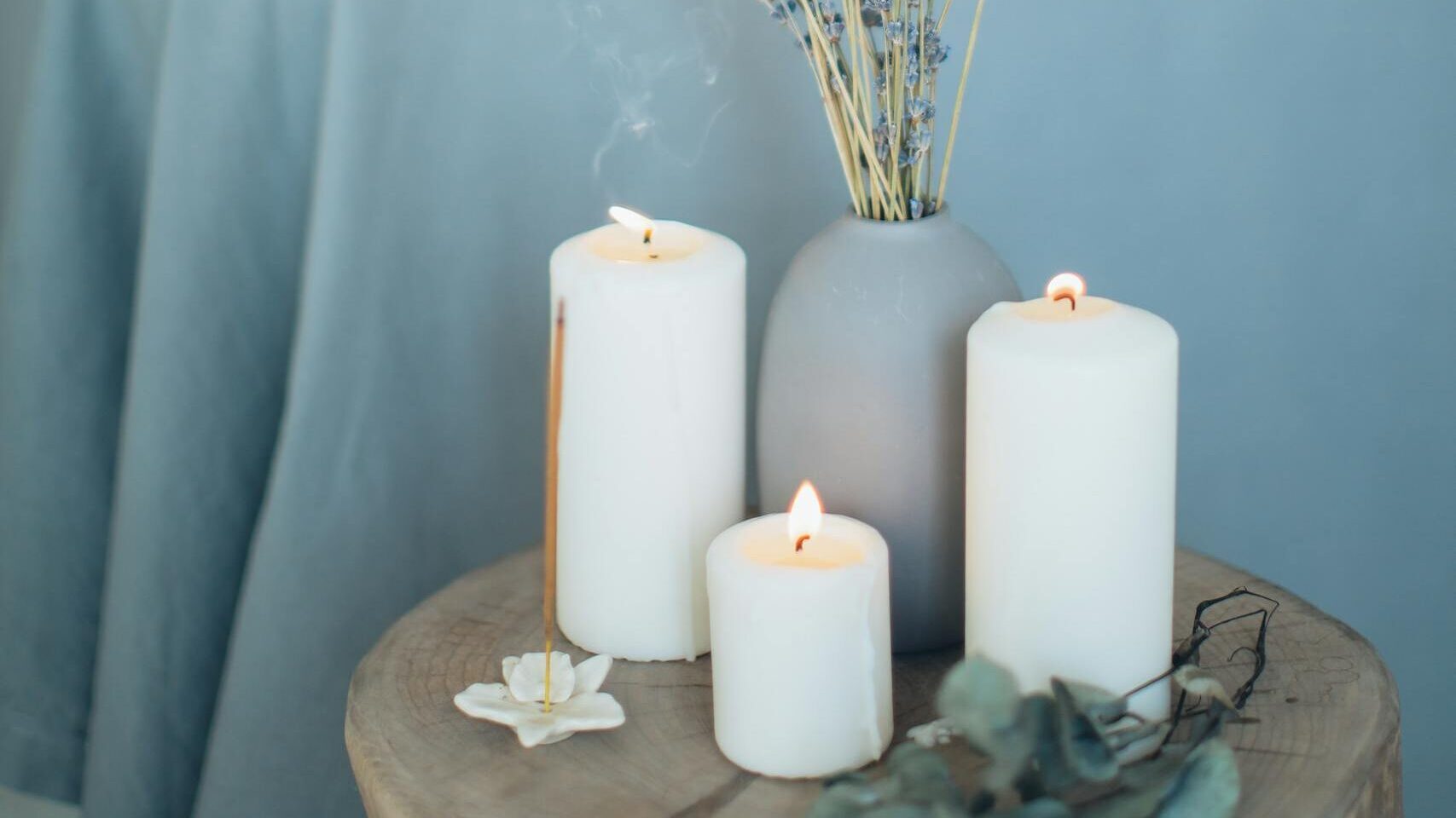 Soothing spa scene with massage, lavender, and candles promoting relaxation.